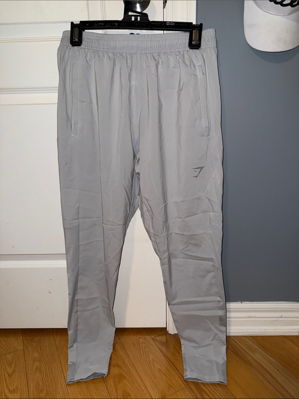 Gymshark Men’s Light Gray Training Joggers with zipper pockets